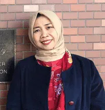 Dra. Junita Widiati Arfani, M.Pd, PhD.